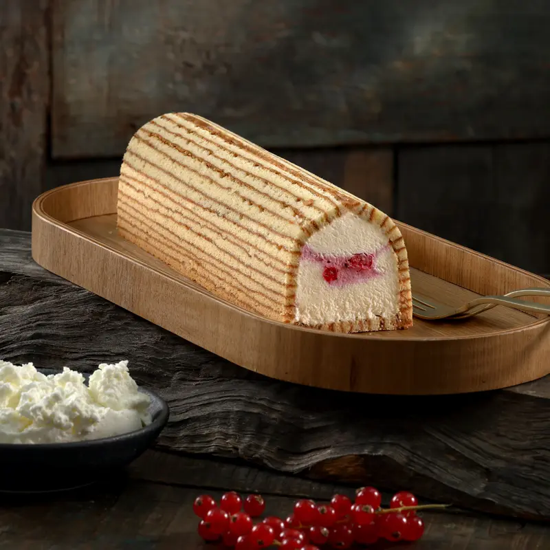 Baumkuchenterrine Topfen Waldbeer - Bonnevit Feinbäckerei